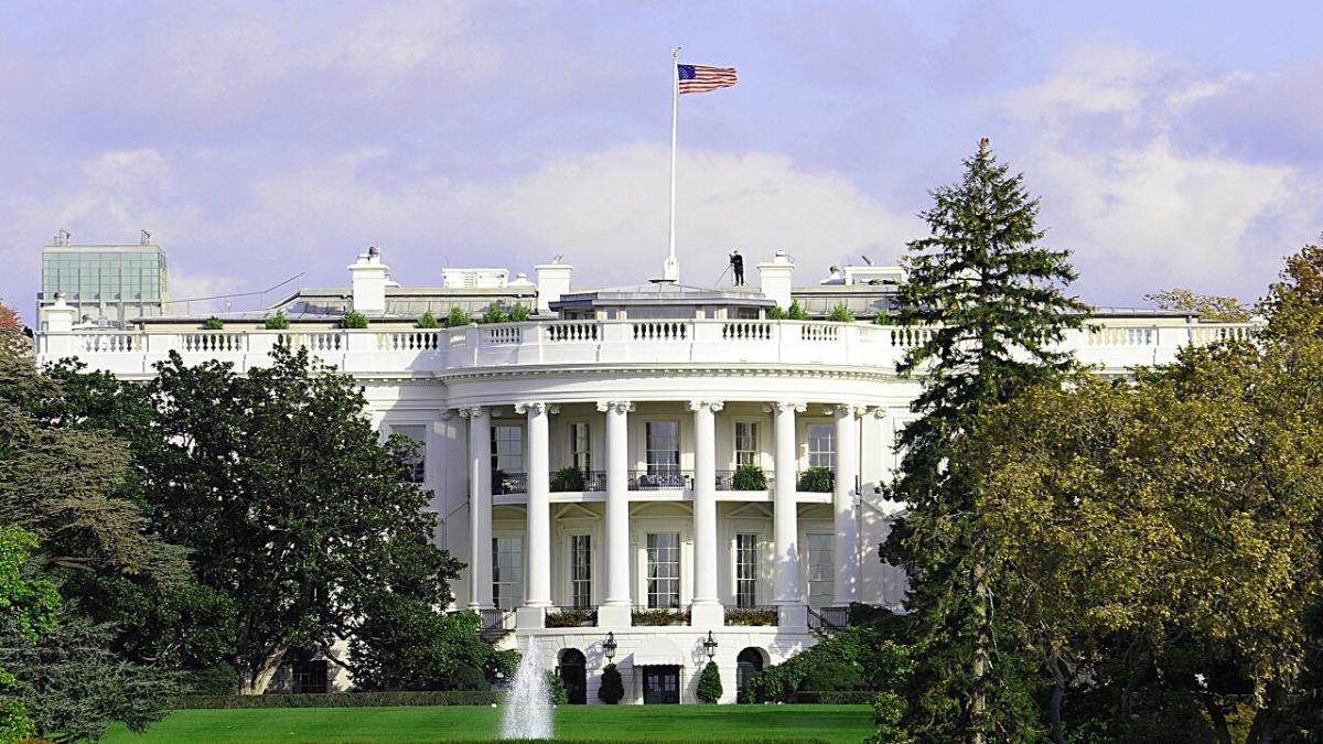 The White House with a US flag flying